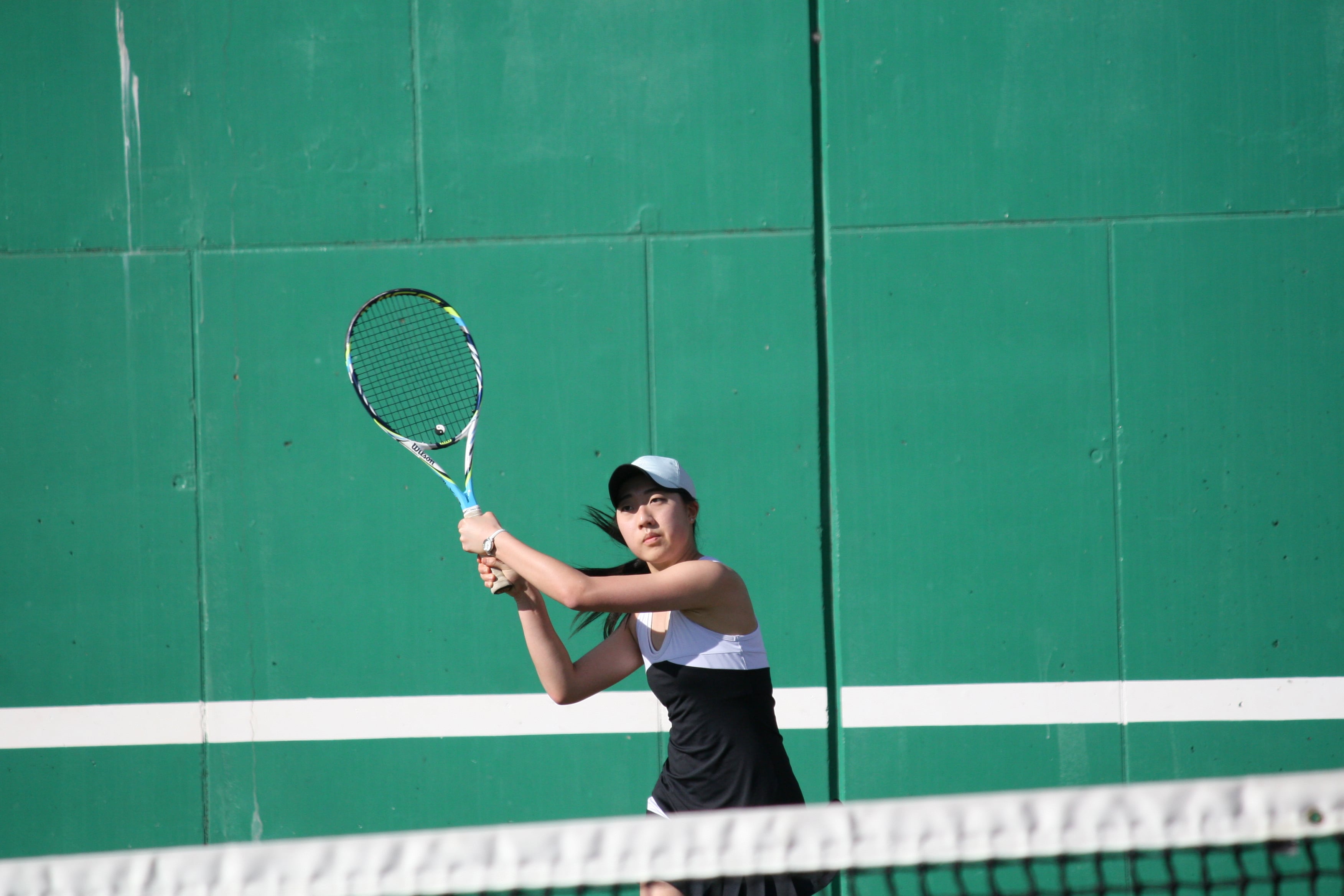 Esther Kwon follows through on her return shot.