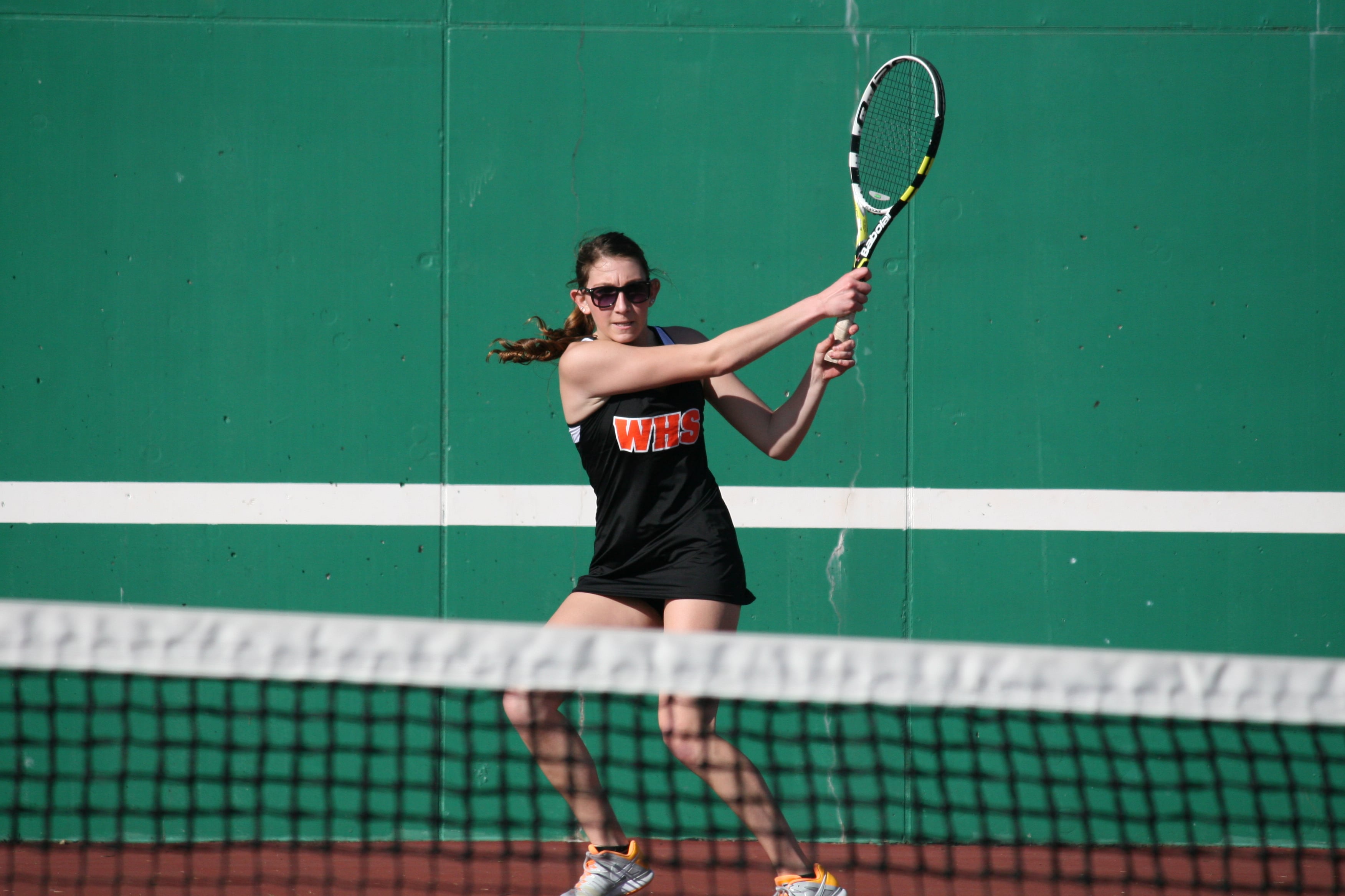Haley Briggs nails a forehand.