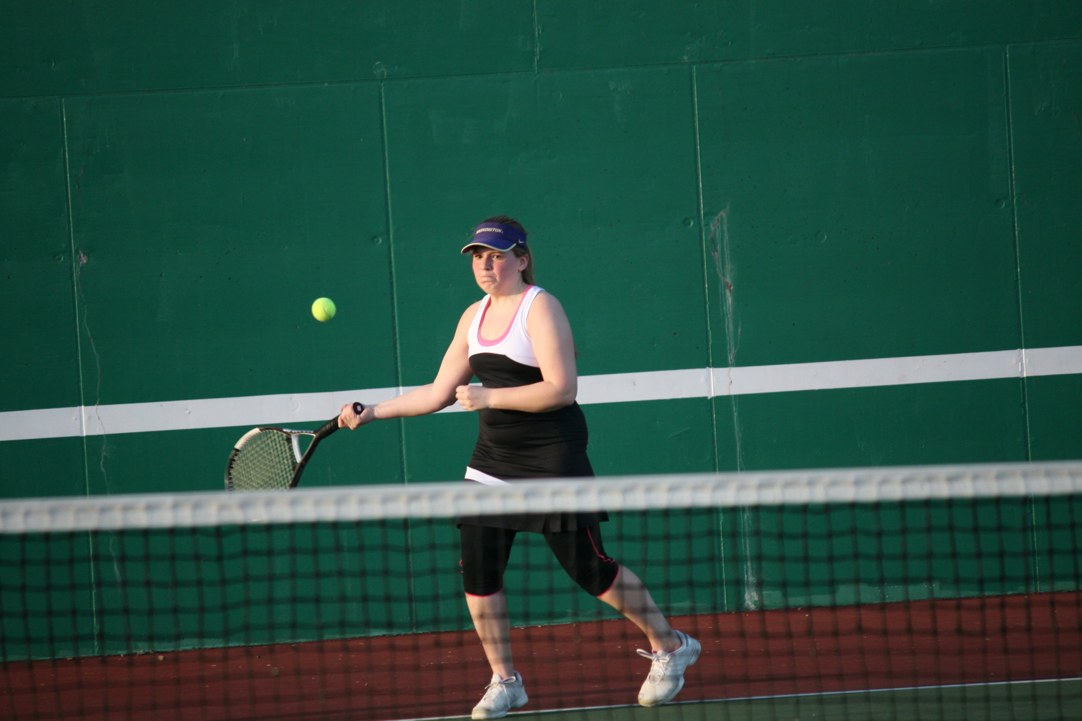 Lauren Belzer returns a serve for the Papermakers.