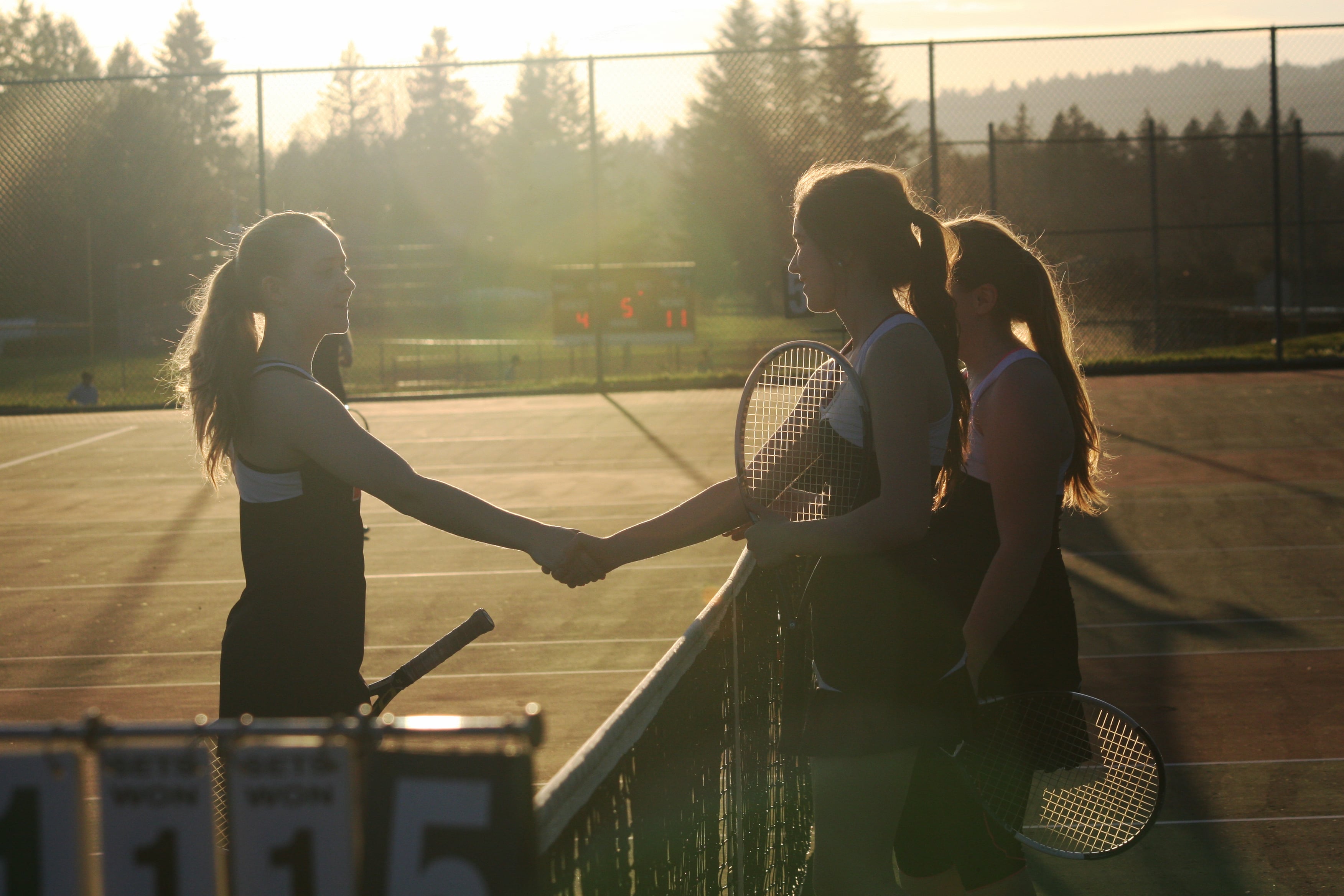 Sun sets on another memorable Camas-Washougal tennis match. This is the only sport the two neighboring towns played against each other this school year.