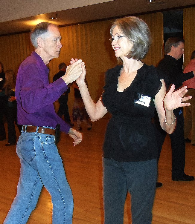 Ballroom dancing has gained in popularity during the past few years. Here, participants in Joseph and Julieann Platt's class master a move.