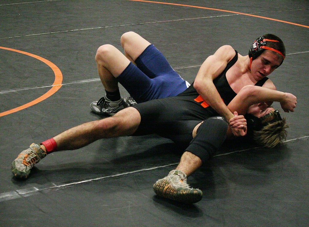 Jesse Reagan pins his first opponent's shoulders to the mat at the Washougal River Rumble Saturday. Reagan, Garrett Duey, Urich Reyes and Taylor Leifsen earned second place medals for the Panthers. A.J. Christiansen and Tanner Klopman took third place.