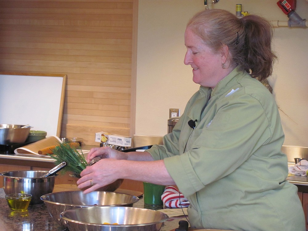 Post-Record file photo
Camas resident and chef Karen Lasher demonstrates French cooking during a class at Clark College's Columbia Tech Center. Lasher's goal is to make everyone feel comfortable in the kitchen.