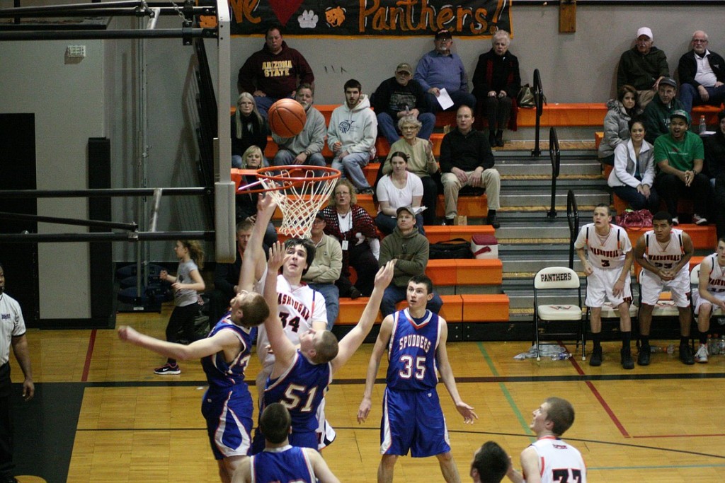 The Washougal basketball players and fans are hanging by a thread watching Aaron Deister's game winning shot go through the hoop with 14 seconds left on the clock. The Panthers defeated Ridgefield 49-46 Thursday for their first league win of the season.