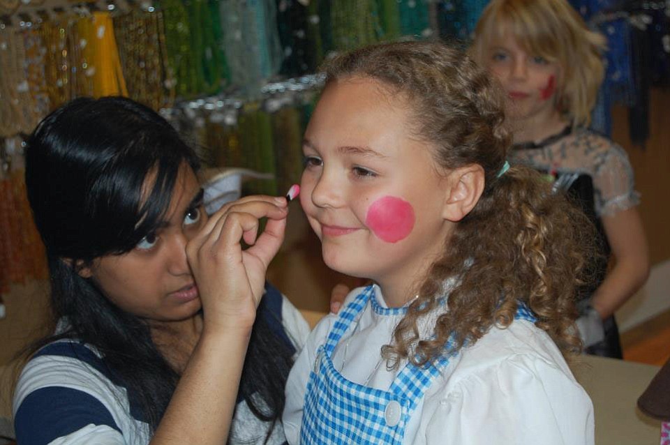 A young partygoer gets her face painted at Bead Paradise in Camas. The business offers different birthday party packages for young and old alike.