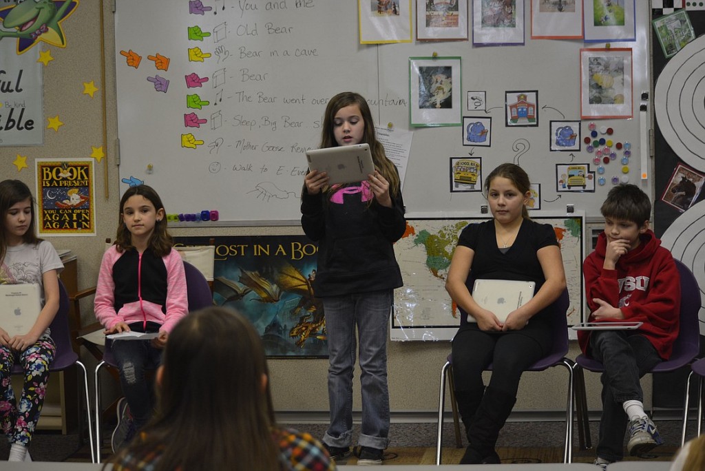 From left, Riley Maddix, Marinah Vargo, Allison Swenson, Danielle Melton and Jackson Lucas take turns listening and speaking during the debate.