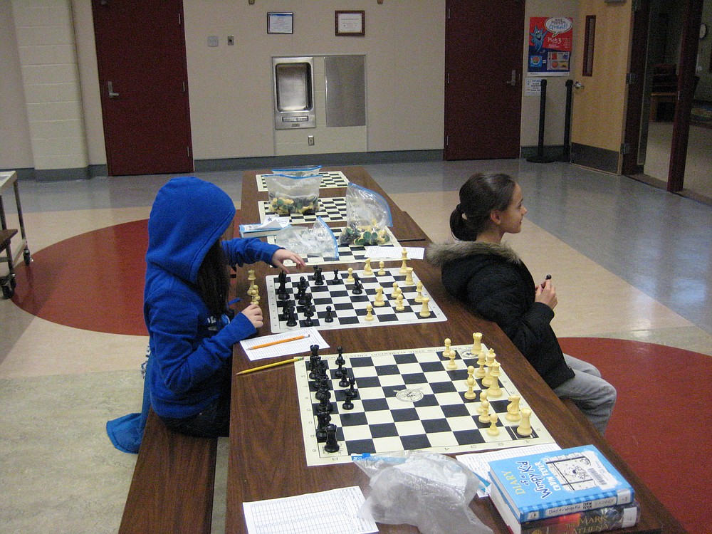Some students catch on to chess quickly enough that they can play with their eyes closed, literally. "We teach them so it becomes automatic," said Alan Svehaug, chess instructor.