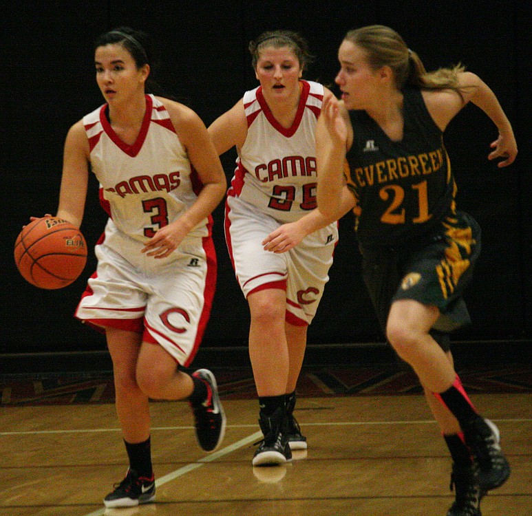 Evergreen couldn't slow down CHS seniors Brenna Khaw (3) and Nikki Corbett Friday. Khaw had 17 points and Corbett added 16 to help the Papermakers beat the Plainsmen 53-29.