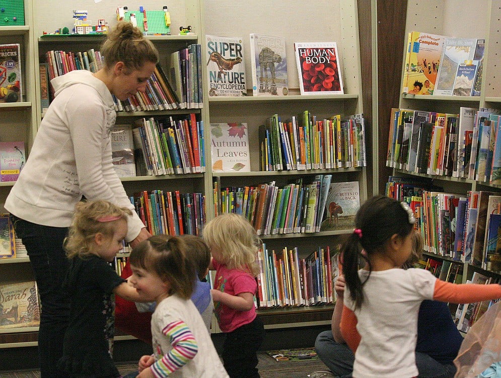 Rachel Nutter, senior library assistant, leads a storytime activity for toddlers at the Washougal Community Library.