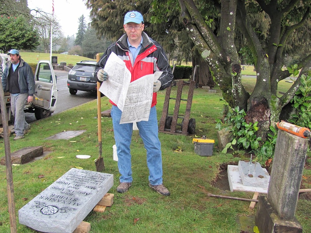 Joey Fuerstenberg, president and owner of Vancouver Granite Works, Inc.,  was on hand Friday to oversee the replacement of the headstone of Alexander Stuber, who died in 1908. The headstone was vandalized beyond repair in October. Vancouver Granite Works contributed to its replacement. "We kept everything on the new headstone in the order that it was before, but changed the font around a little bit to give it more of an updated look." To re-create the headstone, a rubbing (pictured above) was taken of the original one.