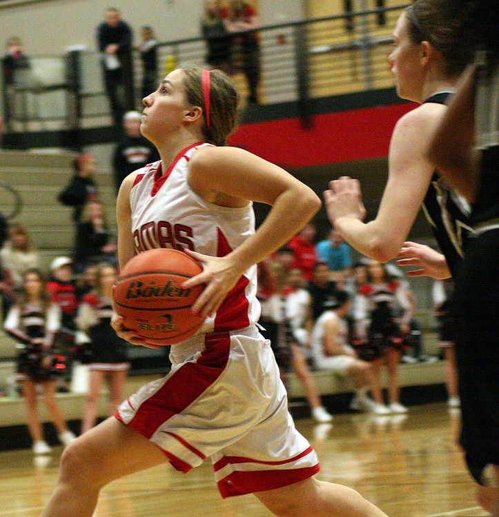 Rachel Rice scores the first basket of the game on Senior Night Friday, in Camas. The Papermakers beat Union 37-30 to solidify second place in league.