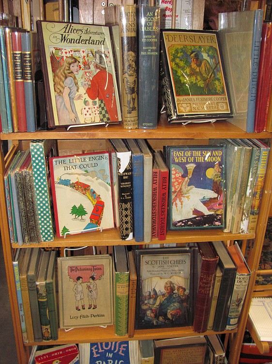 Among rare book dealer Kol Shaver's choices at the antique show were children's literature, Western Americana, maps and other pre-World War II rare books. He enjoys the flexibility of his job and meeting potential clients at different antique shows.  "These people have purposely chosen to come here and are looking for unusual stuff."