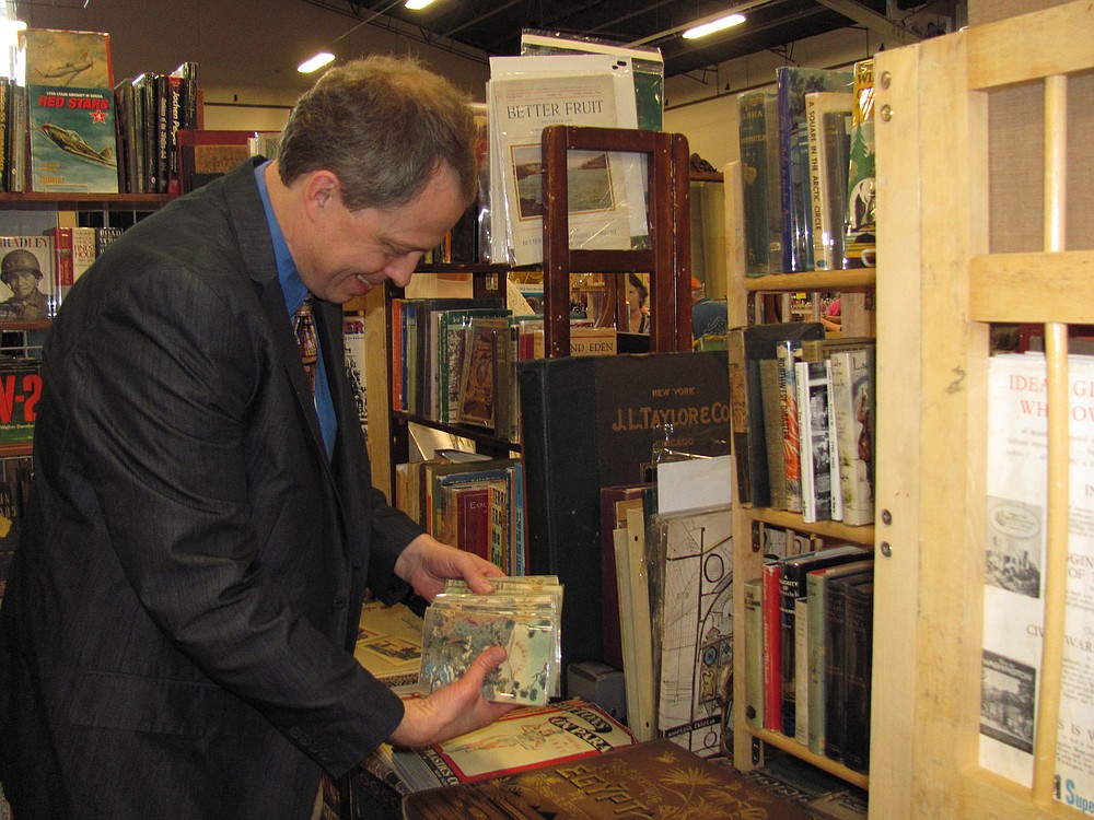Rare book dealer Kol Shaver enjoys the flexibility of his job and meeting potential clients at different antique shows.  "These people have purposely chosen to come here and are looking ofr unusual stuff."