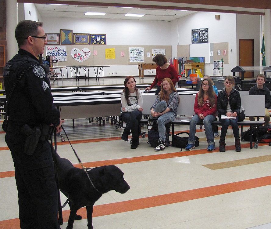 Port of Portland Police Sgt. Jeff Galloway chats with Jemtegaard students about a career in law enforcement. His canine partner, "Wwright," is trained to sniff out explosives.