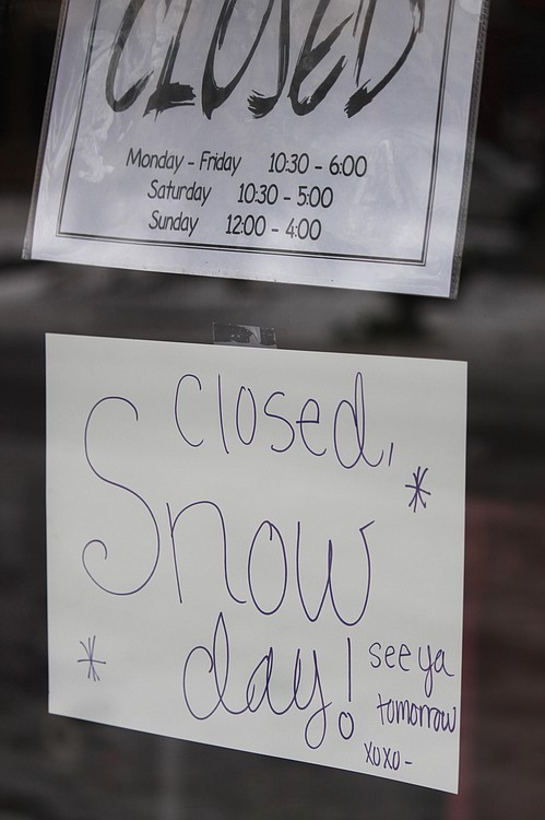 Many local businesses, like Bella Vita Boutique in downtown Camas (pictured above), kept their doors closed over the weekend, for the safety of employees and customers. Most, however, were back open for business by Monday afternoon. On its Facebook page yesterday, Bella Vita posted: "The snow is finally melting! Cure your cabin fever and come shop with us."