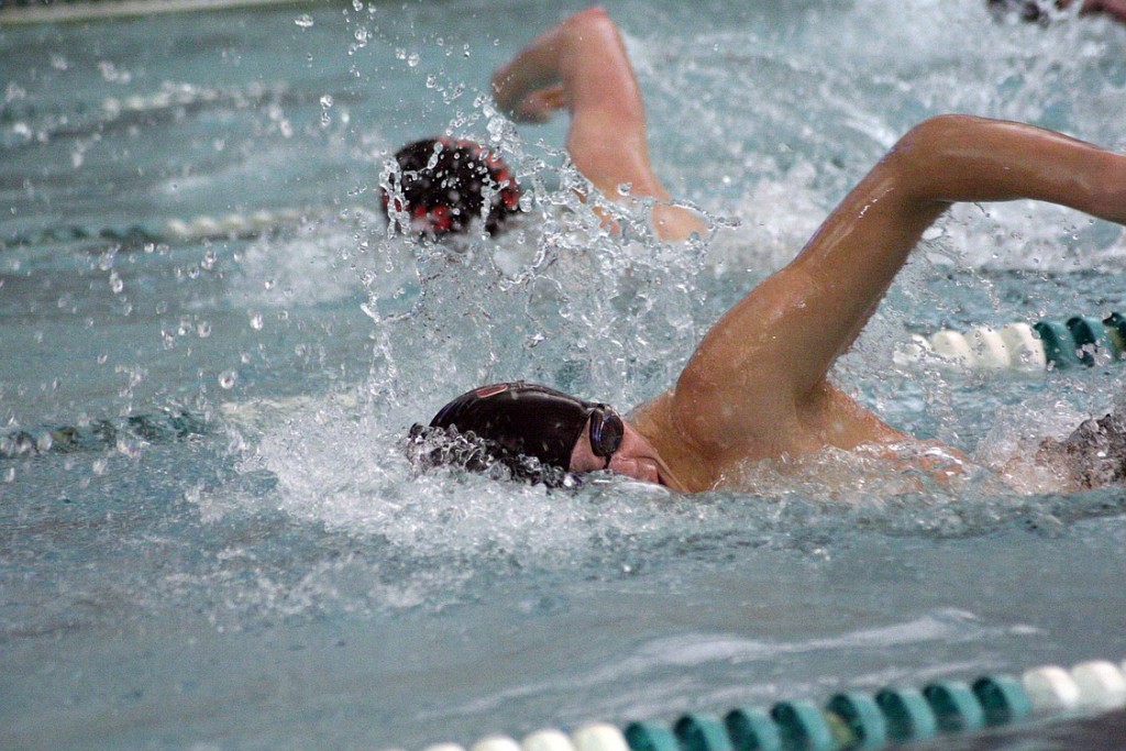 Seth Albert takes the lead in the the 200-meter freestyle 4A district championship race Thursday, at Propstra Pool. The Camas High School senior finished the day with four first place medals to help the Papermakers win the district championship.