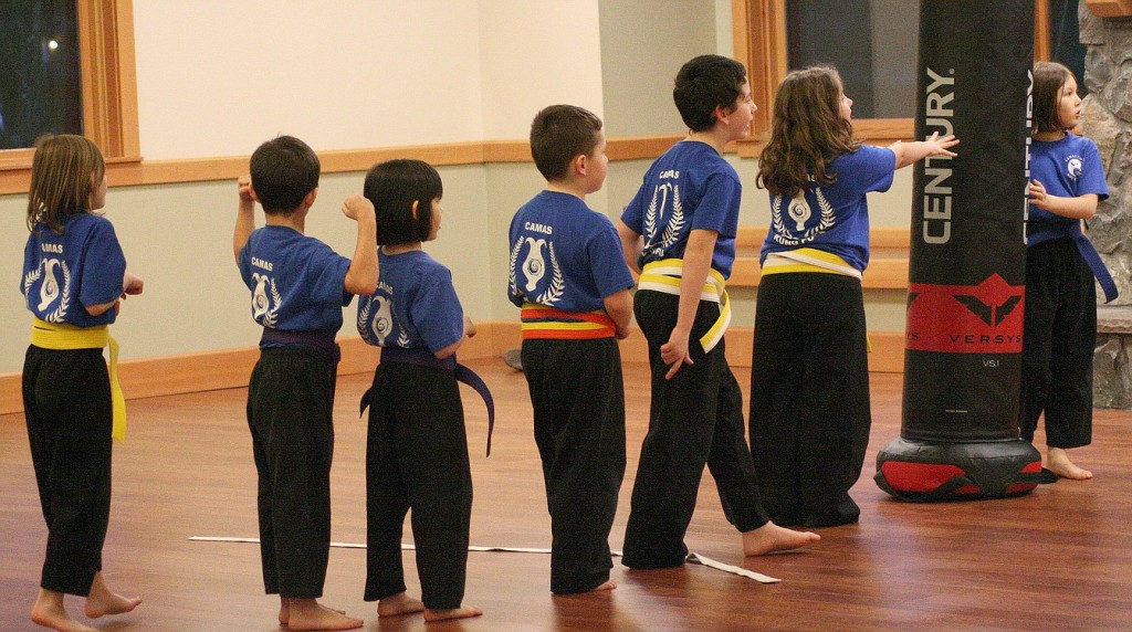 Ayla Crowell, 9, assists during a recent Kung Fu class. She has been taking classes for two years and is hoping to earn a black belt.