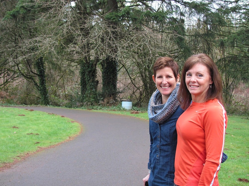 Grable and Quinn have done many workouts together in preparation for triathlons. Here, they pose at the entrance to the Heritage Trail at Lacamas Lake in Camas, a popular running spot.