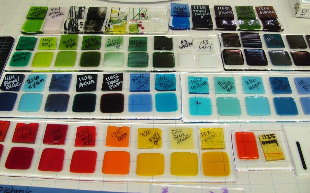 Students pick colors from a palette before beginning their fused glass projects.
