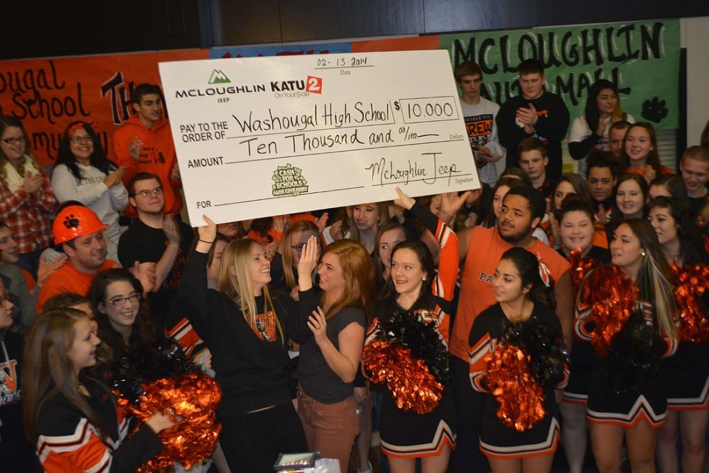An enthusiastic group of WHS students accepted a $10,000 check in the Cash for Schools contest. Students, faculty and administrators will meet to decide how to spend the money.