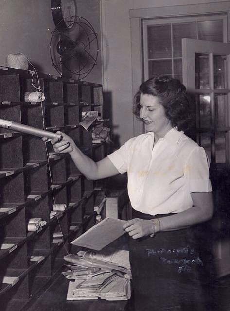 London served in the Navy during World War II. Here, she works as a postal clerk at a base in South Florida.