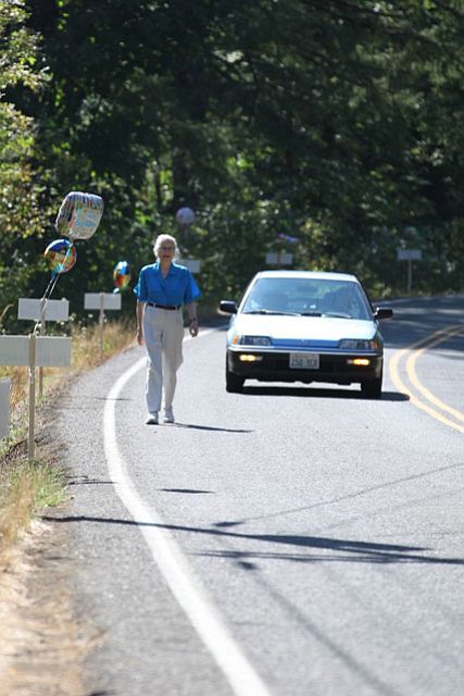 London walked her usual route at Washougal River Road on her 90th birthday. Her family and friends hung balloons to greet her along the way.