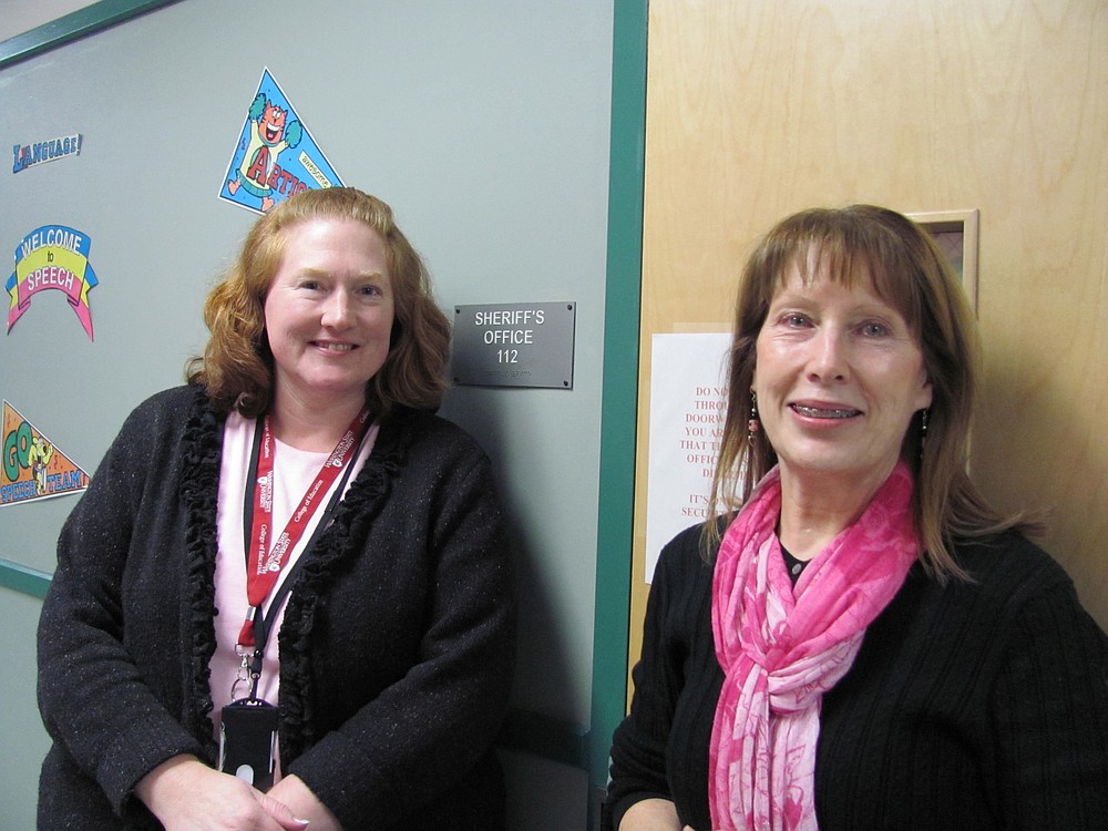 Mary Lou Woody, Cape Horn-Skye Elementary School principal (right), and Penny Andrews, second-grade teacher, enjoy having a Skamania County Sheriff's Office substation at their school.
