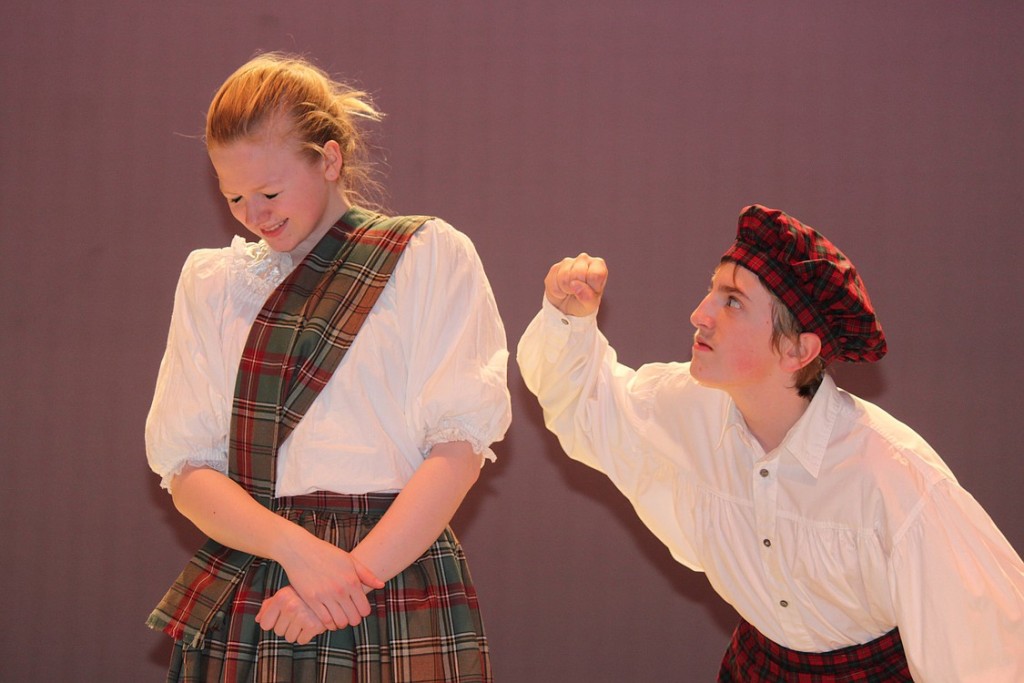 WHS actors have been rehearsing for "The 39 Steps" since January. Here, Crofter (portrayed by Alex Wilmoth) threatens Margaret (Bridgette McCarthy). The play is a screwball comedy that takes place in the 1930s in England and Scotland.