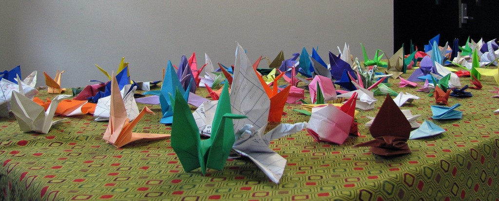 Colorful origami decorates a table at the festival. Participating in traditional crafts is one way for the community to learn more about the Japanese culture.