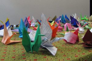 Colorful origami decorates a table at the festival. Participating in traditional crafts is one way for the community to learn more about the Japanese culture.