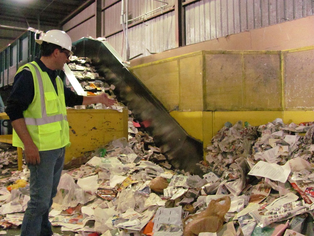 Nottenkamper describes the process recycled paper goes through before it is compacted into a half to full ton bale and exported.