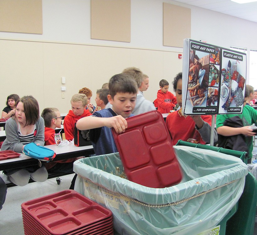 Hathaway Elementary School third-grader Joseph Berry feels it is important to recycle properly. "We want the Earth to stay blue and green," he said.