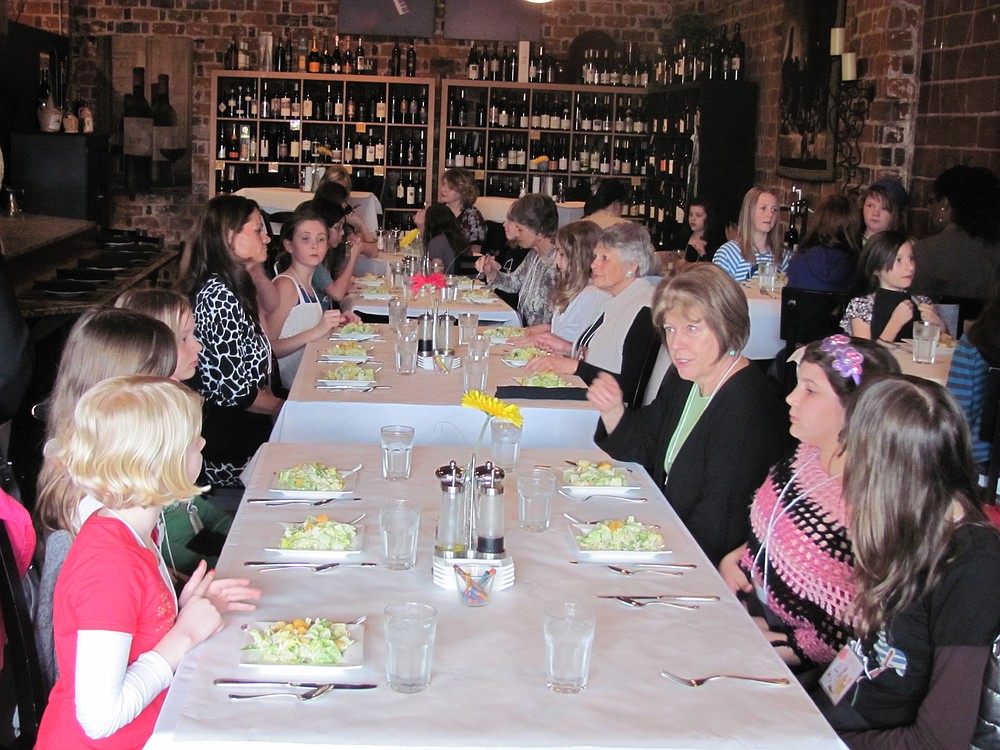 Young Women in Action is a program for fifth-grade girls designed to teach them new skills and increase their confidence. Here, they enjoy a meal with their mentors.