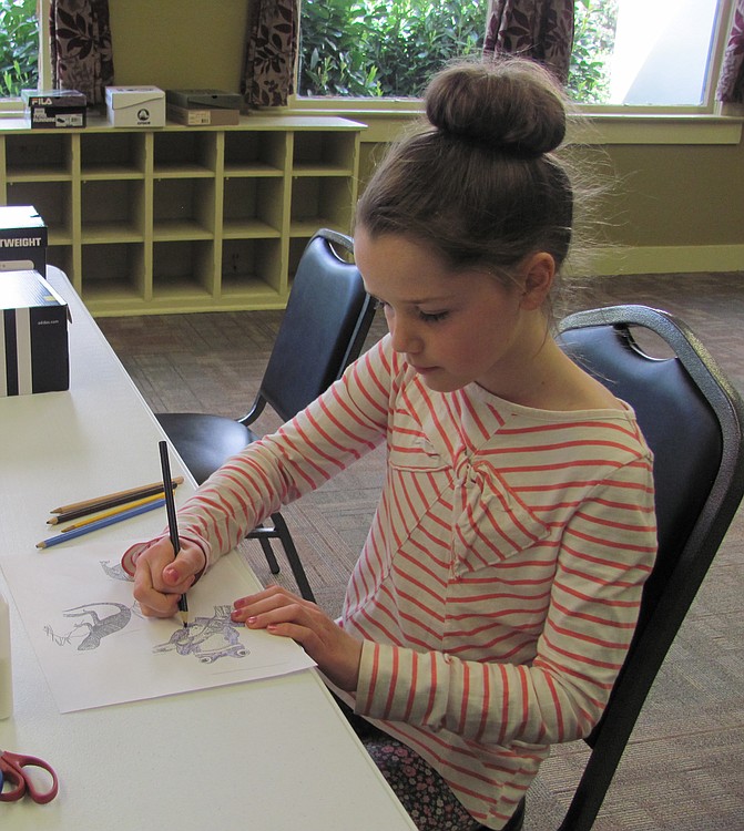 Ella Wright, 9, enjoys attending Parker's art classes. "I just like everything," she said.