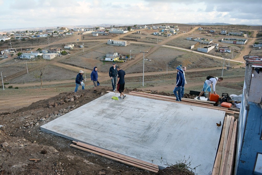A cement slab with anchor bolts was all that awaited volunteers  when they arrived at the build site.