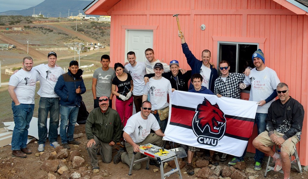 A group of 14 men from Ellensburg traveled to Baja, Mexico to build the house. Pictured back row, from left, are CWU alumnus Jason Barrom, CWU student Evan Tidball, Baja Christian Ministries foreman Hector Perez Barraza, Victor and Jessica (brother and sister), CWU alumni James Heberling and Karl Miller, CWU students Nate Osborne, Jesse Zalk, Dalton Baunsgard and Paul Heberling, CWU alumnus Ryan Wilkins, CWU senior Joey Race and Ellensburg businessman Craig Ronning. Front row from left, Ellensburg businessman Steve Willard and CWU professor James Avey.