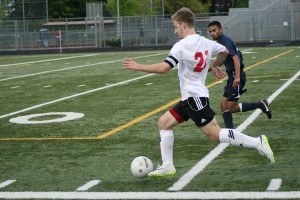 Nate Beasley breaks loose with the soccer ball Friday, at Doc Harris Stadium. Beasley and Cameron Eyman netted goals, but Skyview equalized Camas' effort. So the question remains, which team is better?