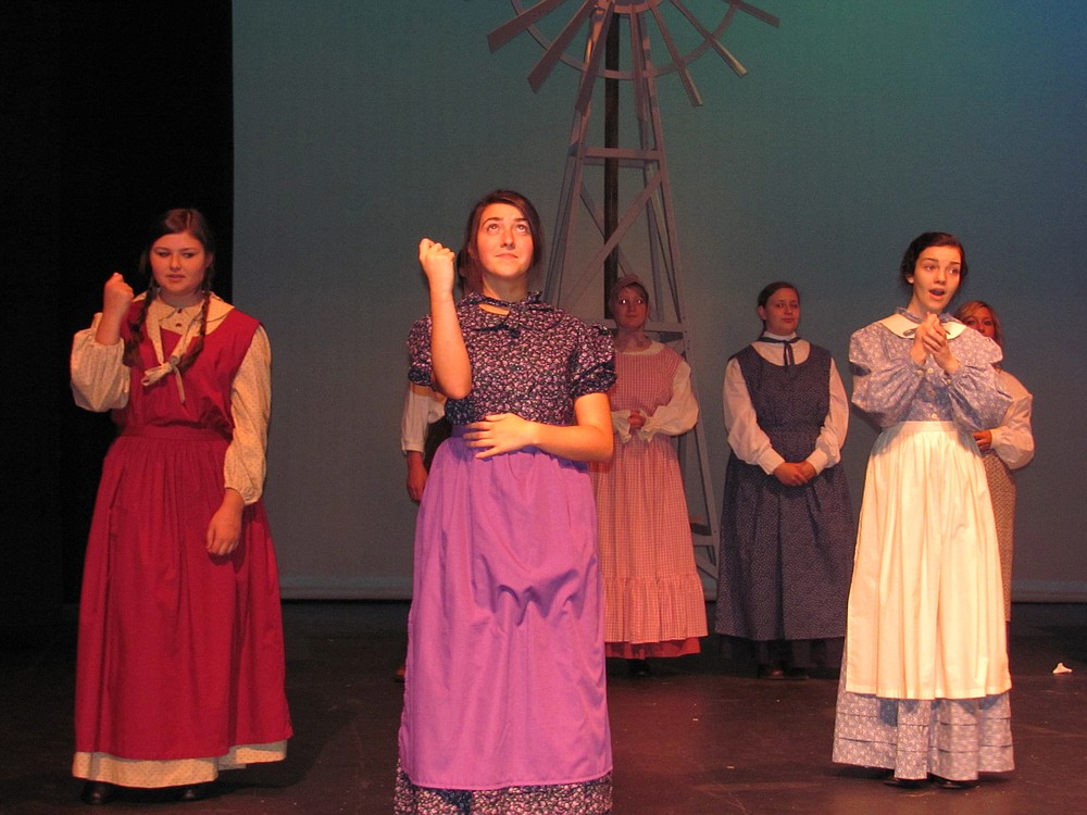 From left, Danielle DeVall, Madison Hulcher and Zoe West reflect on their mother Sarah Vonham's legacy in the song "Pieces of Lives."