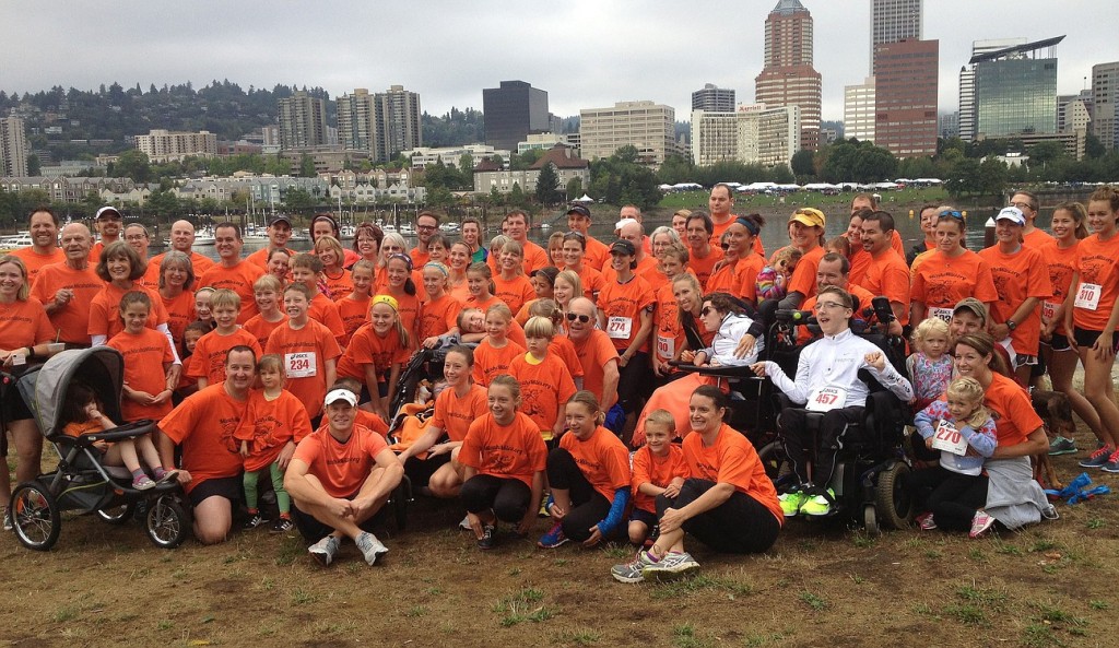 The Micah's Miles team poses for a photo during an annual fundraising event for United Cerebral Palsy of Oregon & Southwest Washington. Registration is now open for the 2015 event at www.walkrollrun.org.