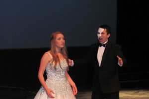 The Phantom (Nick Stevens) sings to Christine (Sydney Valaer) during "Music of the Night."