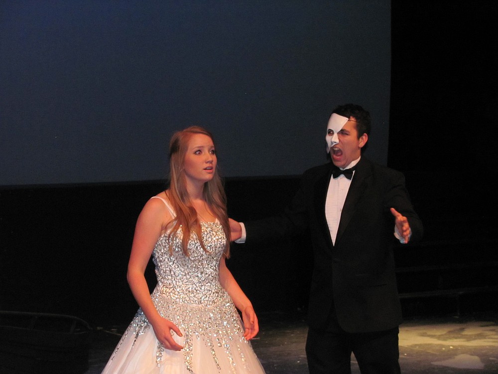 The Phantom (Nick Stevens) sings to Christine (Sydney Valaer) during "Music of the Night."
