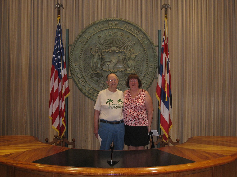 Elton and his daughter, Susie Keeney, pose inside the Hawaii state capitol.