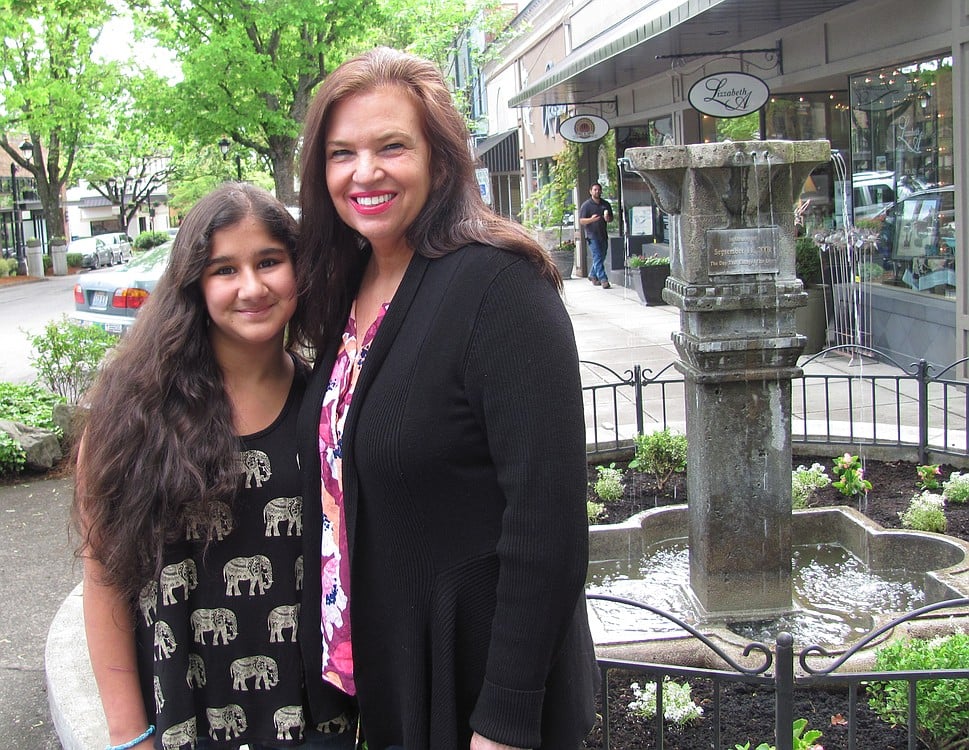 Maya (left) and Michelle Tuell first met when Maya was a 10-month-old living at an orphanage in Nepal. Michelle brought Maya home to live with her family permanently when she was a year old, and has detailed the experience in a recently published book, "Our Angel From Nepal."