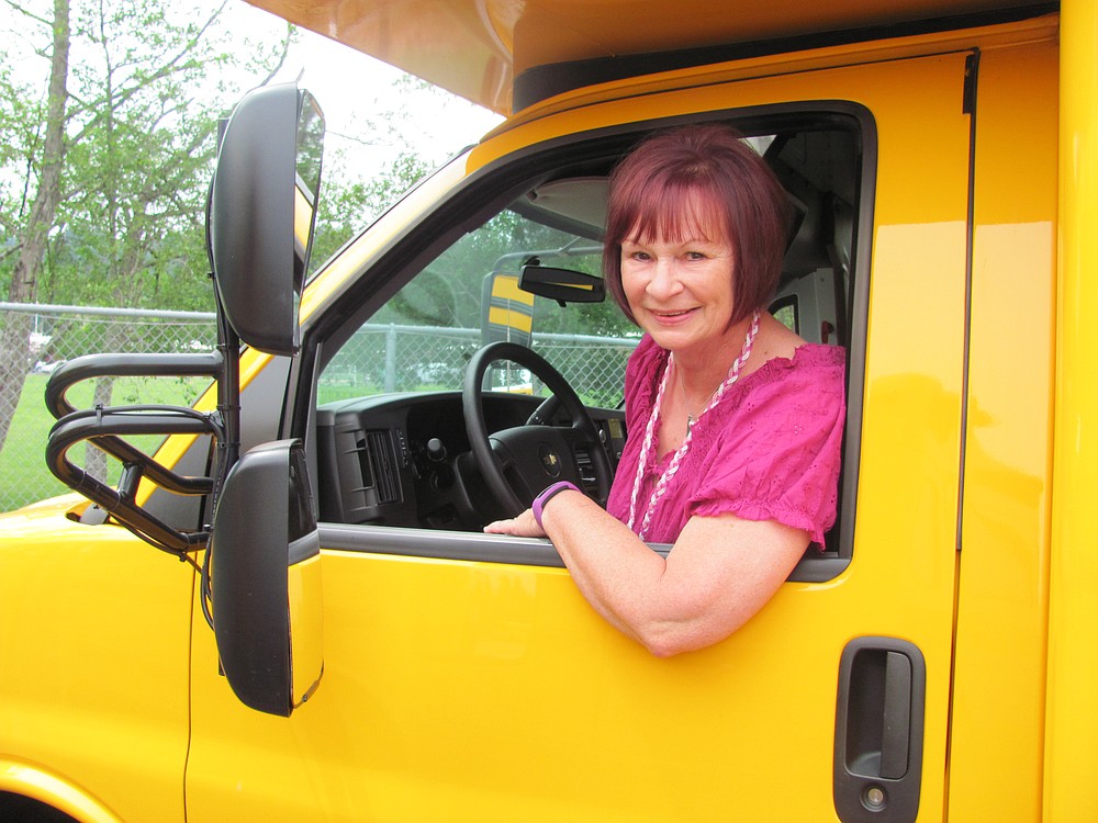 Debi Lasselle (left) enjoys her job transporting special needs preschoolers for the Camas School District. "The biggest challenge I have is becoming too attached to the kids. They are wonderful," she said.