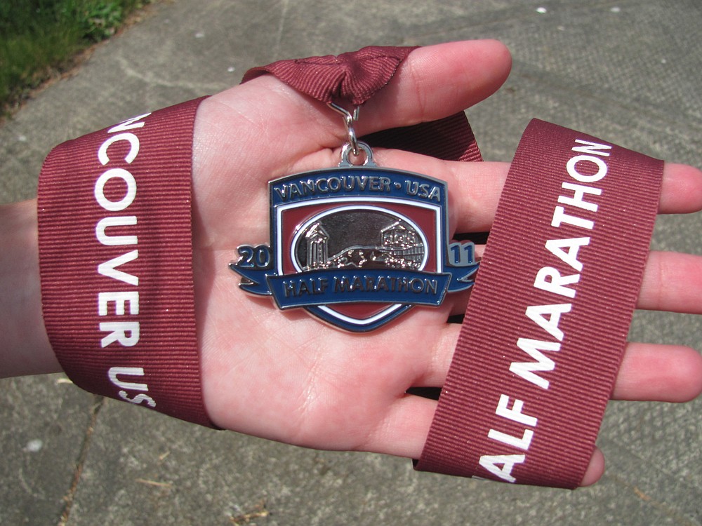 Lattimer pushed through pain to earn this medal for finishing a half-marathon last year. She will run the same race again in just a few weeks.