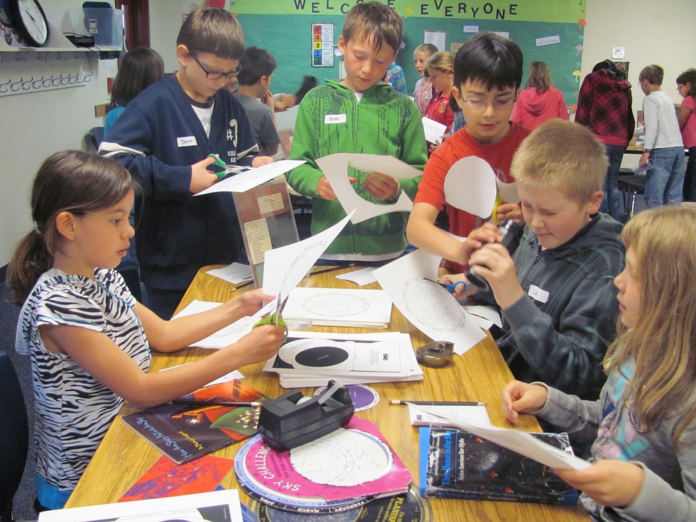 Fourth-graders make star finders at the OMSI interactive workshop at Dorothy Fox Elementary School in Camas.