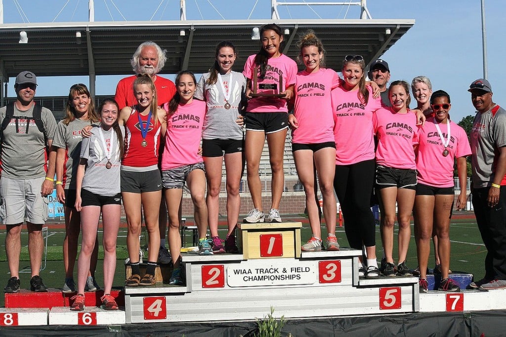 The Camas High School girls track and field athletes and coaches stand on the podium in third place at the state championship meet Saturday, at Mt. Tahoma High School, in Tacoma.
