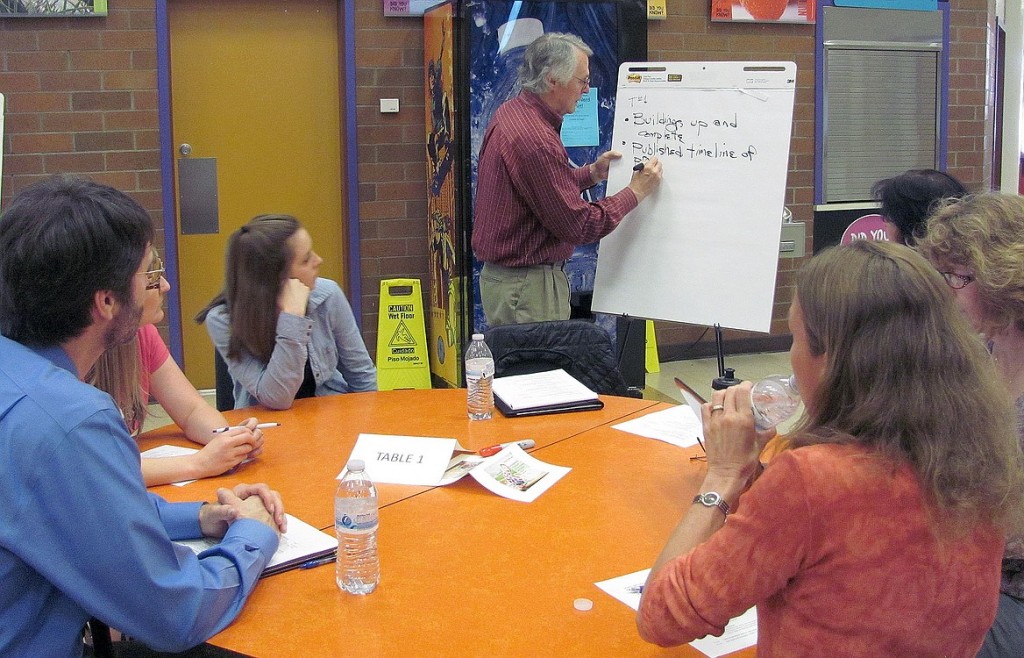 Attendees at the design symposium met in small groups to discuss their ideas on the future of three new buildings in the Washougal School District.