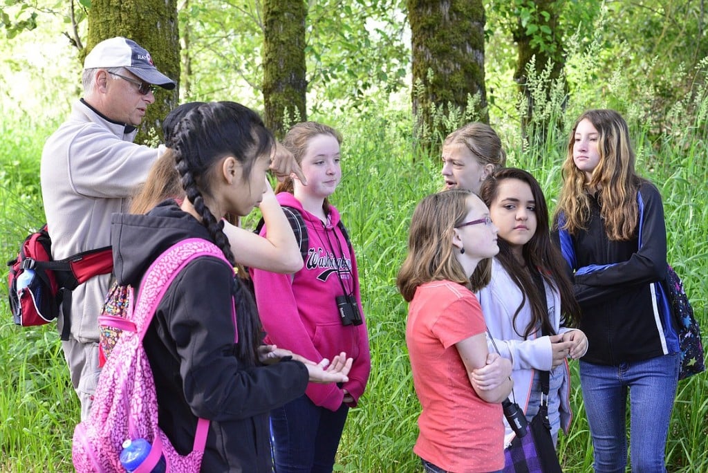 Students learn more about native plants during an interpretive walk at Steigerwald National Wildlife Refuge.