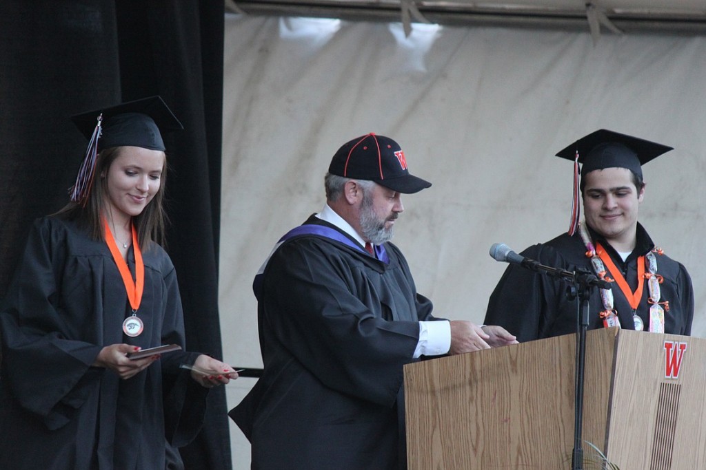 Washougal Mayor Sean Guard (center), a 1980 WHS graduate, presents Danielle Larson (left) and Kasey Bassett (right) with Citizenship Awards.